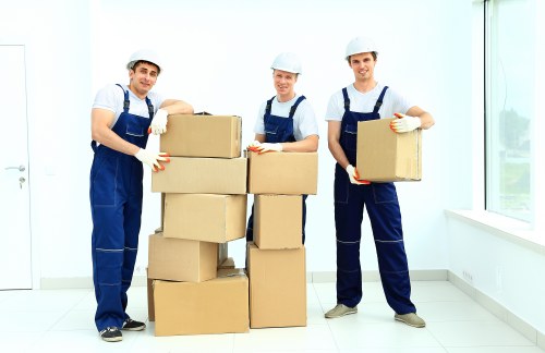 Packing boxes and household items ready for a man and van move