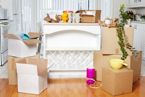 Professional movers handling household furniture during a home move in Locksbottom