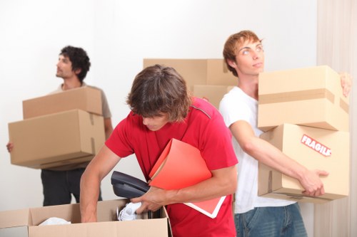Loading furniture into a removal van near Locksbottom streets