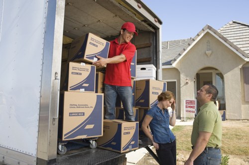 Local removals van helping with household items and furniture