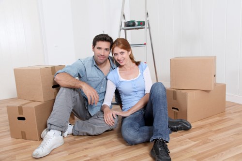 Professional movers handling bulky household items during a Locksbottom house removal