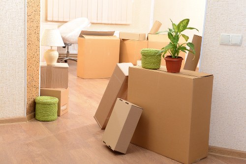 Organised unpacking service placing boxes into rooms at a Locksbottom property
